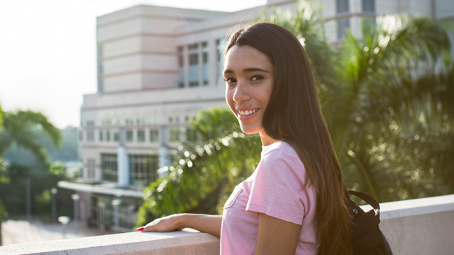 Student on campus garage portrait