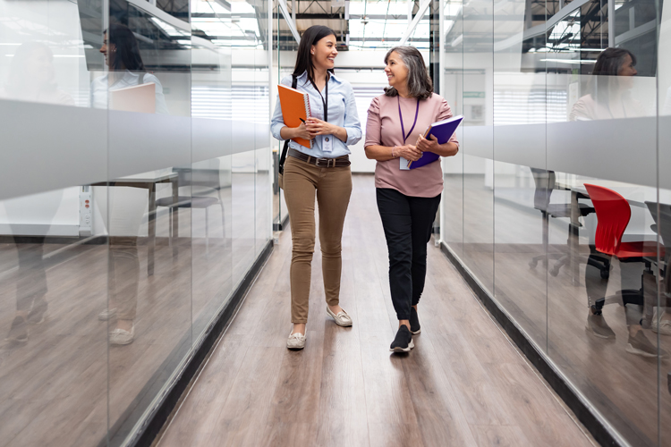 Faculty walking on hallway