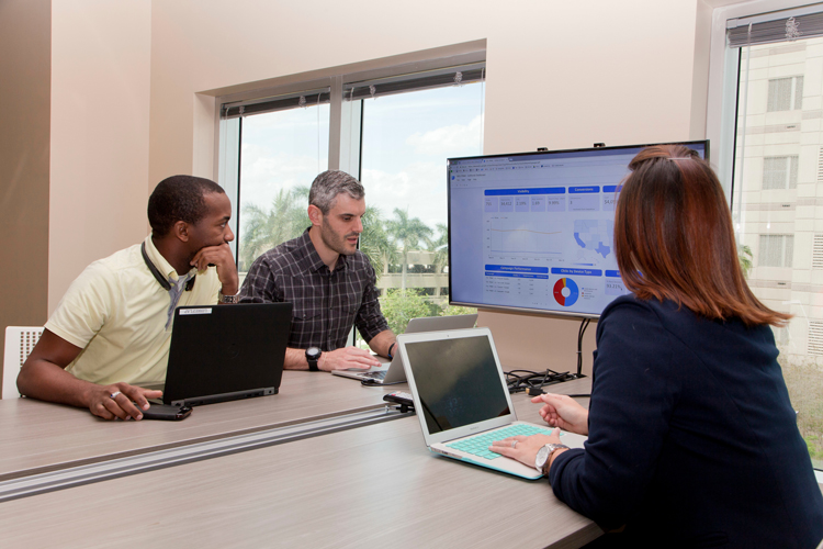 General education students looking at screen