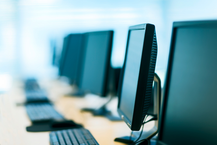 Classroom with desktop computers closeup.