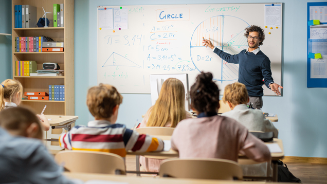 Enthusiastic teacher explains lessons to class