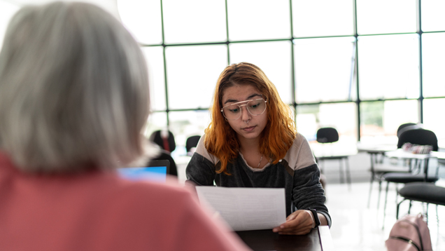 Student having assistance with dissertation