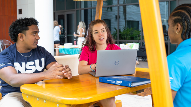 Education-images-636x358/student discussing in outdoors about tuition and fees