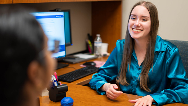 Woman working in student affairs office