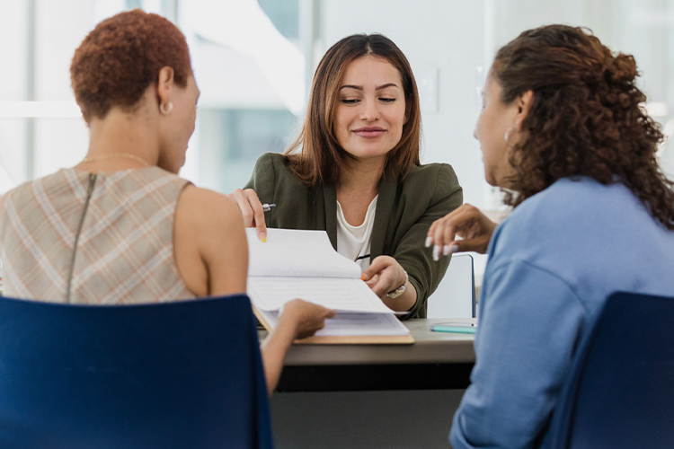 Group of people reviewing documents