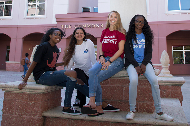 Group of NSU Shark Residents sitting outside