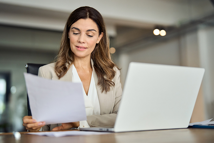 Woman looking at documents in the office