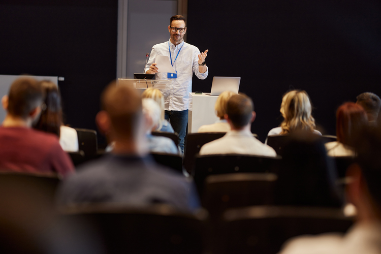 Person doing teaching and learning conference