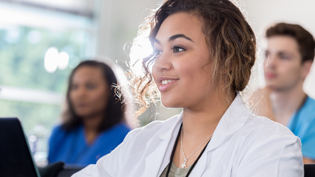 Health care female student focus in classroom