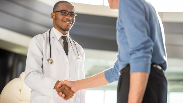 Medical student handshake meeting medical leaders
