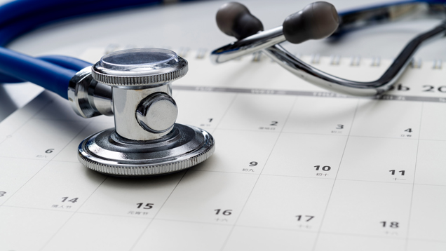 Stethoscope on calendar closeup