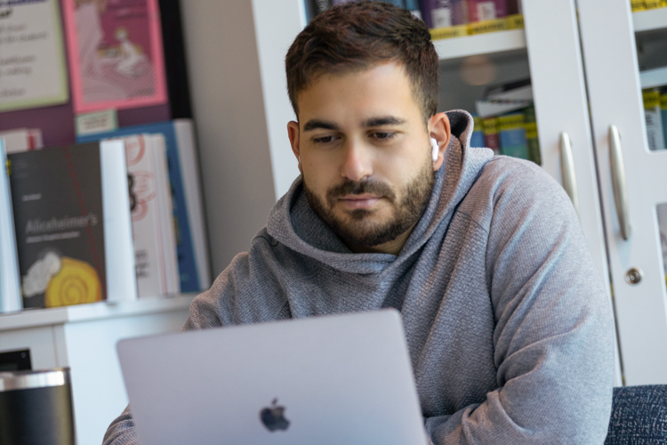 Student using Apple computer