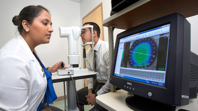 Woman doing an advanced digital eye scan