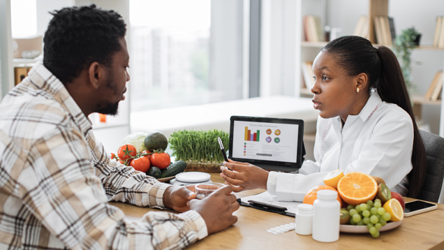 Dietician giving plan to client