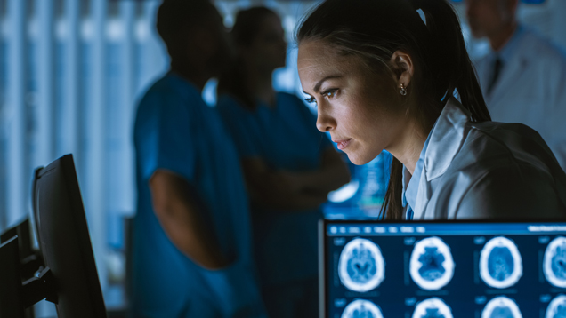 Health inormatics woman looking at screen