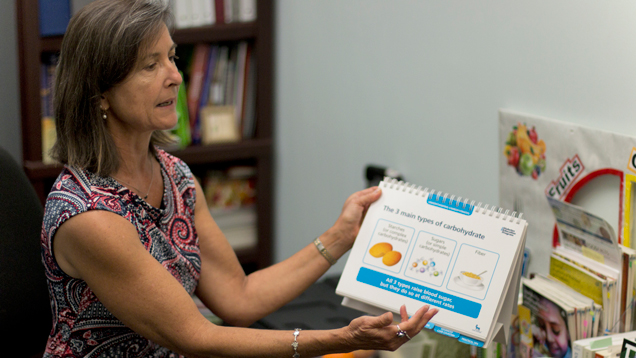 Woman holding nutrition guide