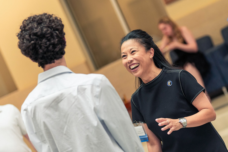 School member woman excited with a big smile about student success