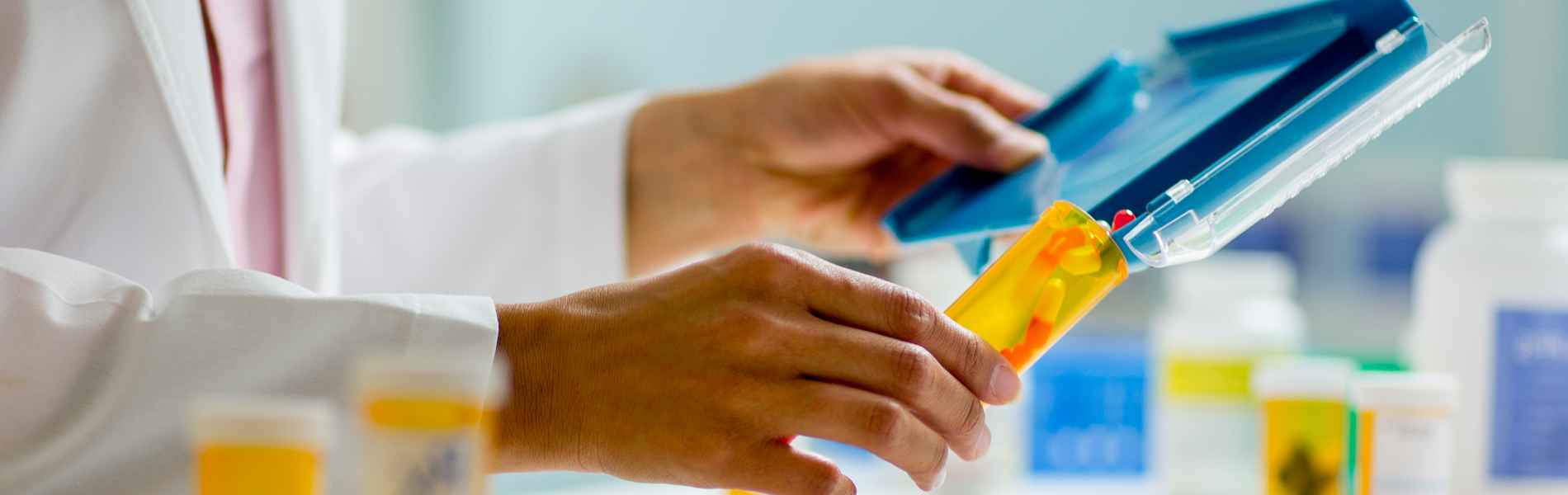 Pharmacist filling prescription close up