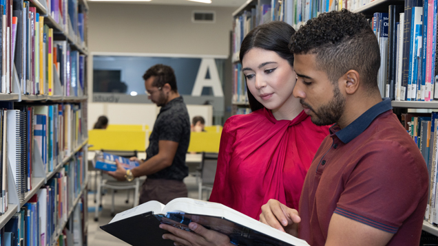 Master of science in pharmaceutical affairs program students in library