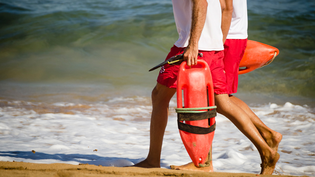 Lifeguards walking on the beach