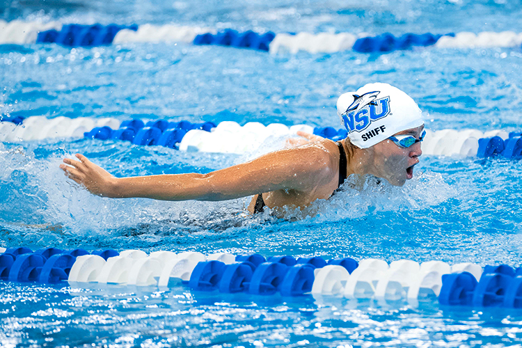 NSU club swimmer competing