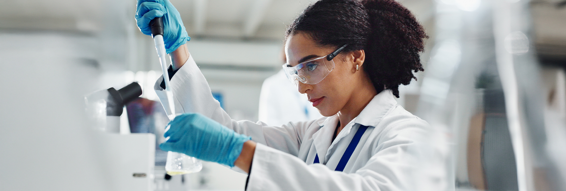 Scientist conducting an experiment in a laboratory