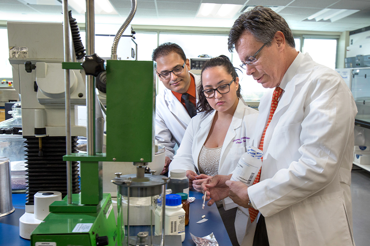 Team of scientists working in a lab