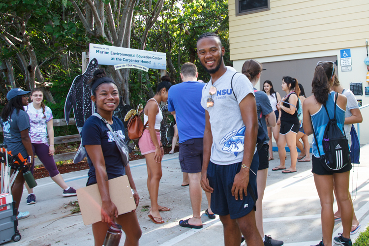 NSU students at service opportunities smiling