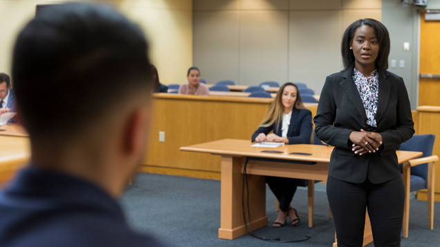 NSU law graduate at courtroom