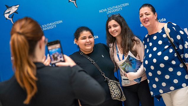 NSU student with her family posing for a picture