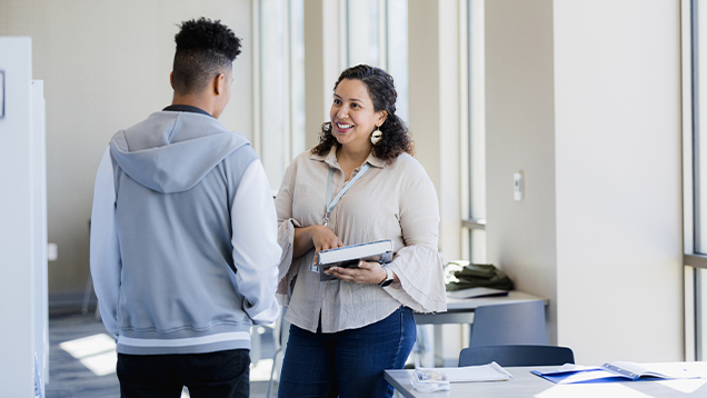 Student talking with his career coach