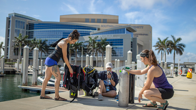 Students outside ocean campus marina