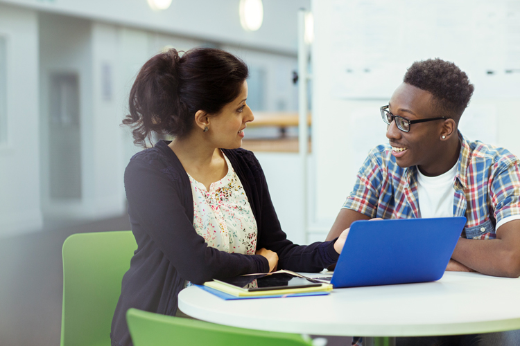 Advisor giving career tips to student