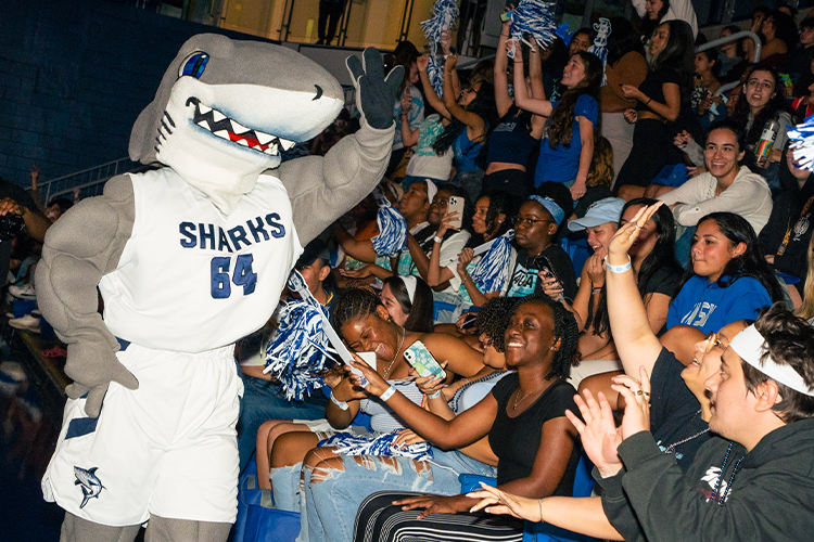 NSU razor celebrating with students at an event